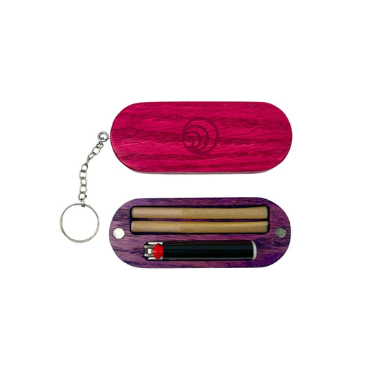 Joint Carrying Case - Open with Contents: The pink oak carrying case opened, revealing space for two classic-sized joints and a small Bic lighter, neatly organized